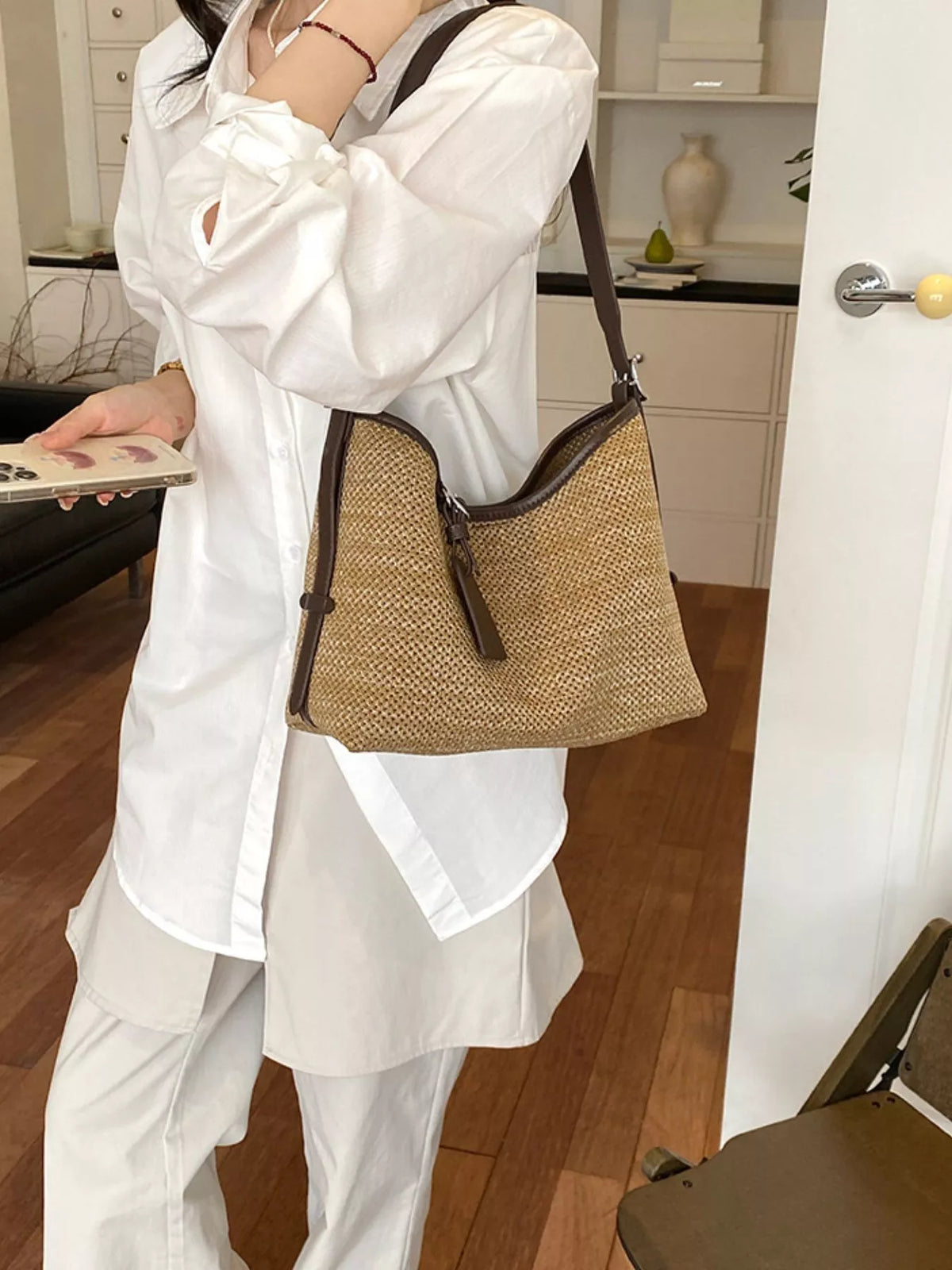 Camel woven shoulder bag with dark leather trim and short side tassels