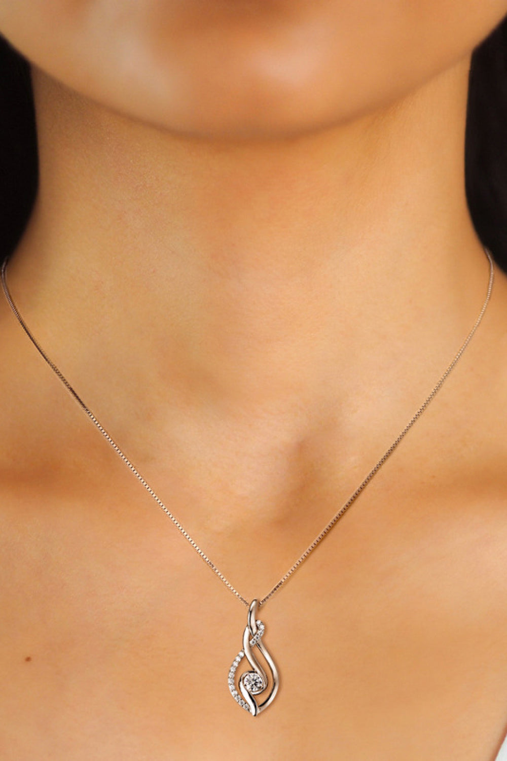 Silver moissanite necklace with leaf teardrop pendant and round center stone