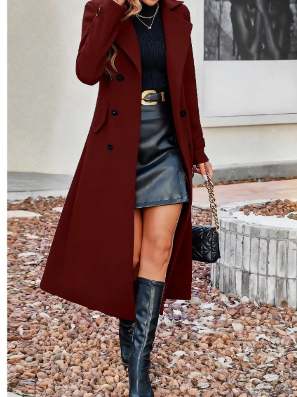 Women’s deep red double-breasted longline coat with notched lapels and button front