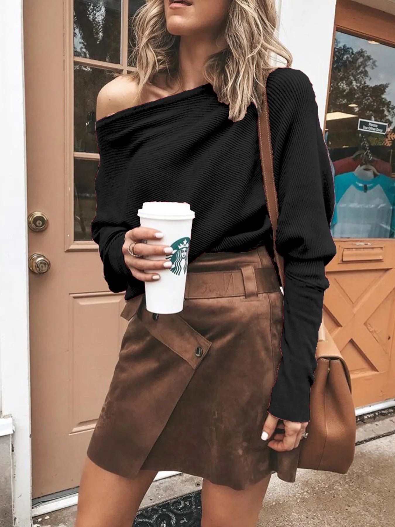 Black one-shoulder ribbed sweater with long sleeves and off-shoulder neckline