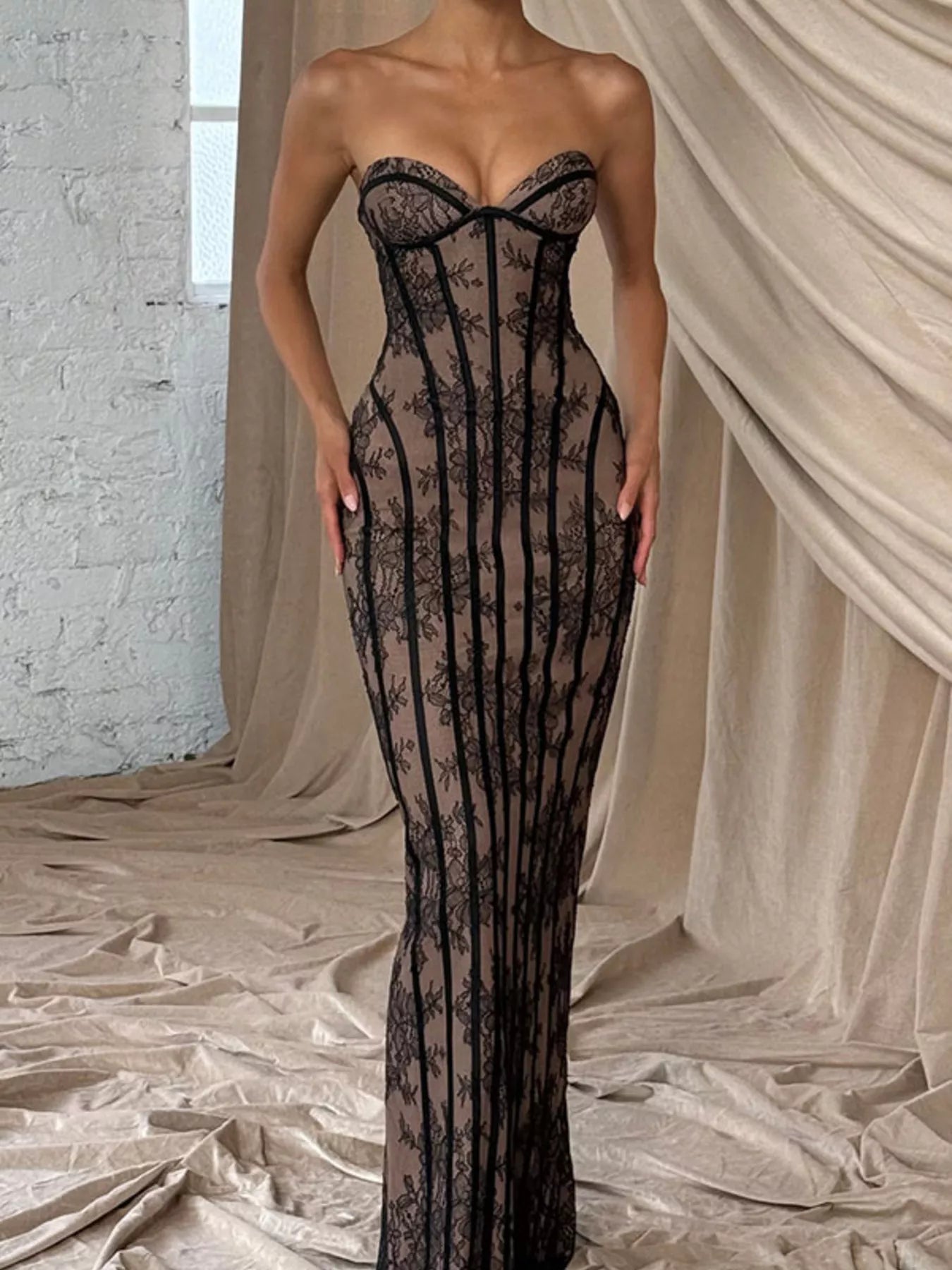 Cedar & Moore Lace Up Back Strapless Maxi Dress in black lace over nude lining