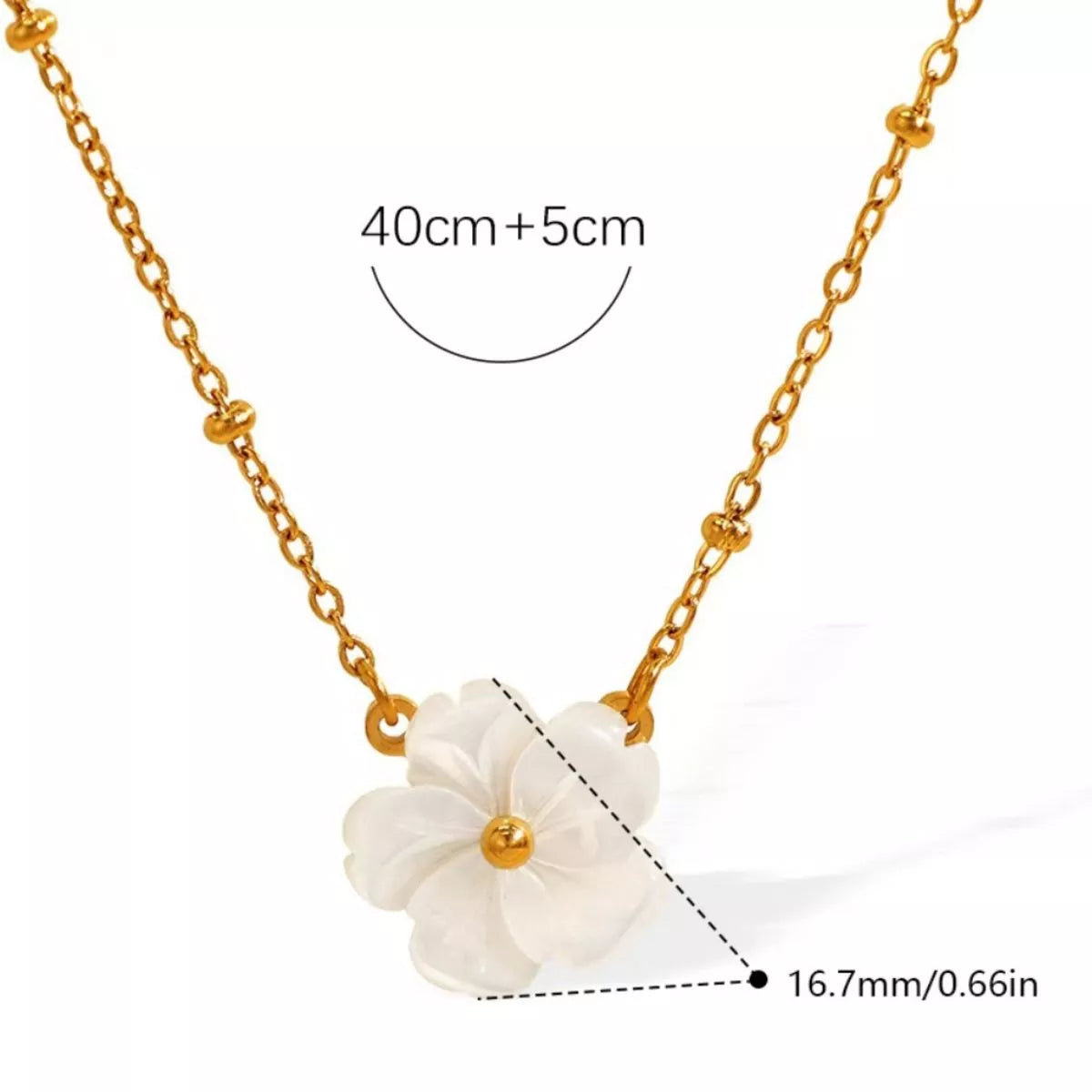White flower pendant necklace with gold-tone chain, size line and measurement mark