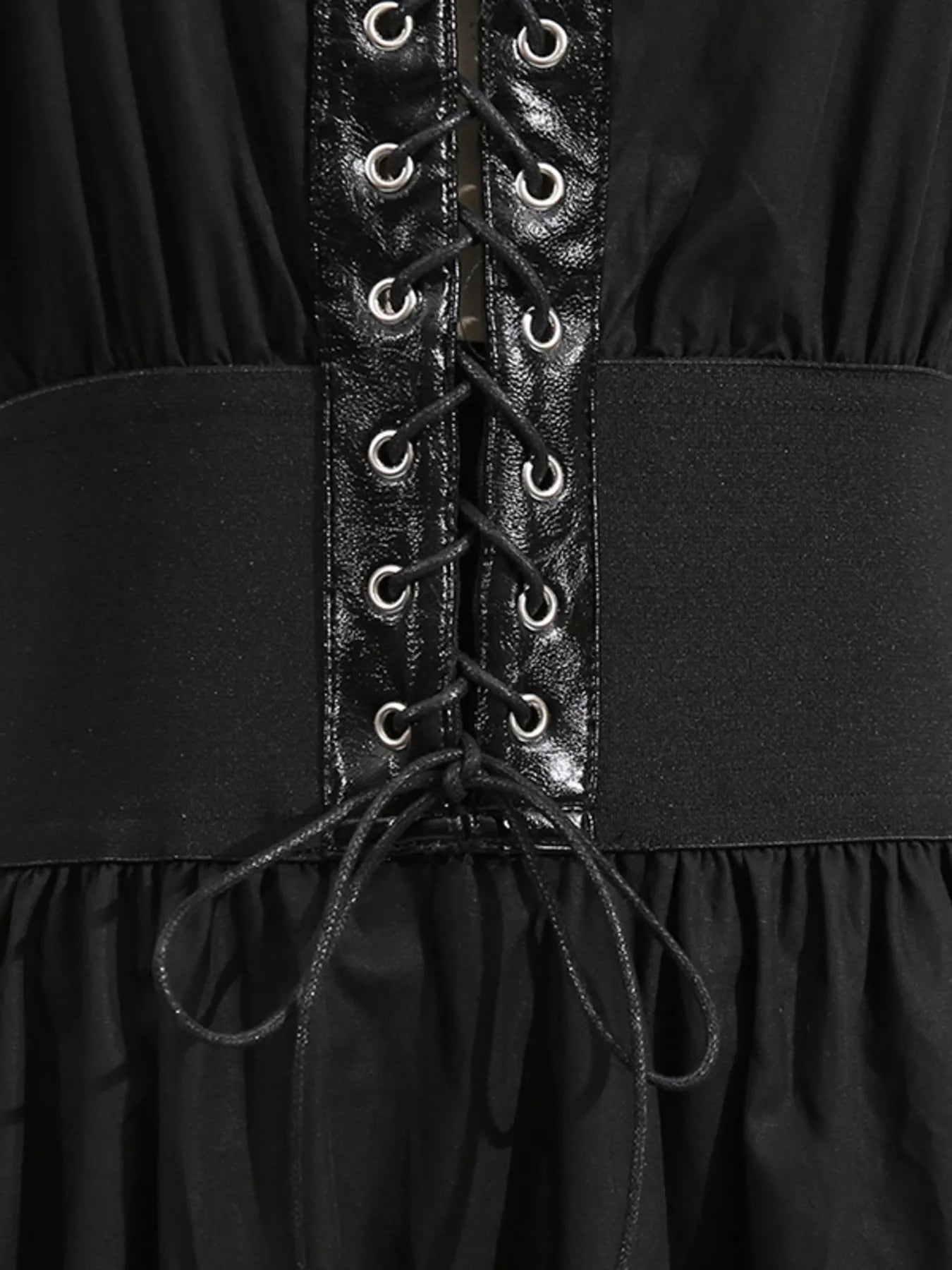 Cedar & Moore Lace-Up Corset Dress with black glossy front panel and metal grommet lacing, sleeveless midi