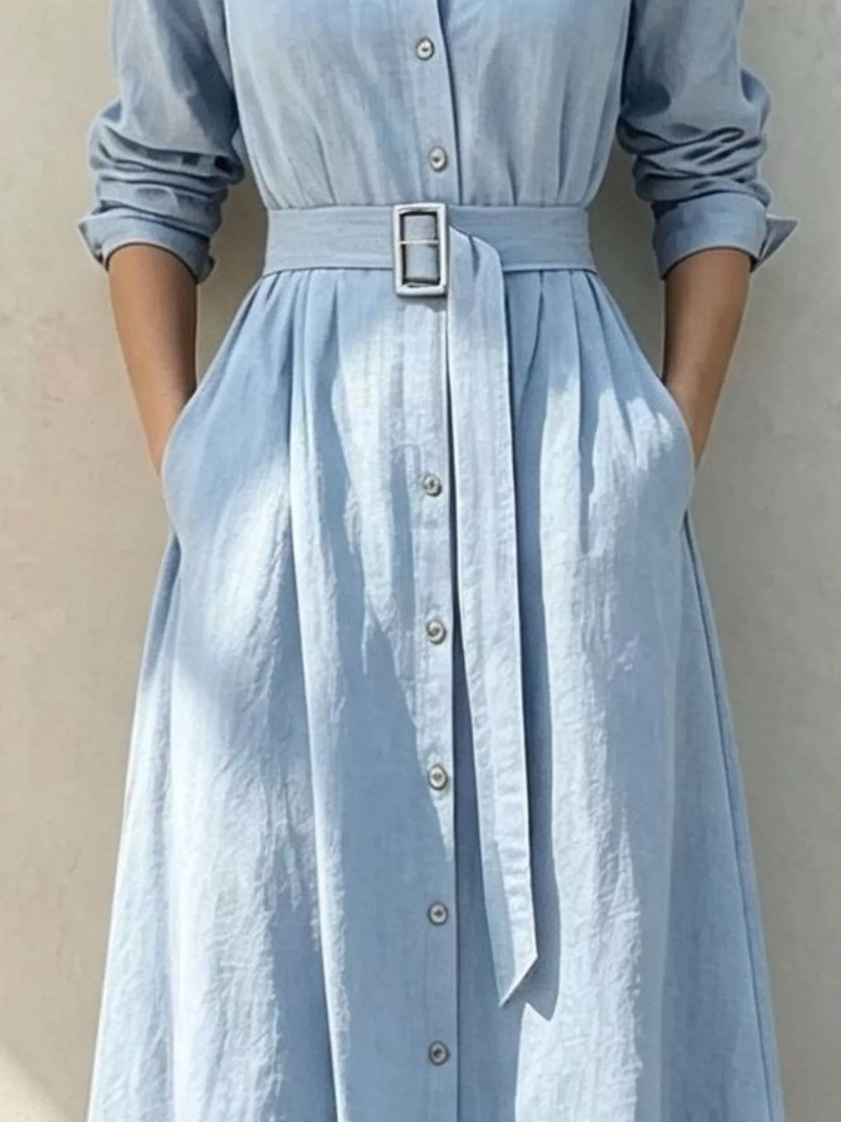 Light blue button-front midi shirt dress with belt and buckle, collared neckline