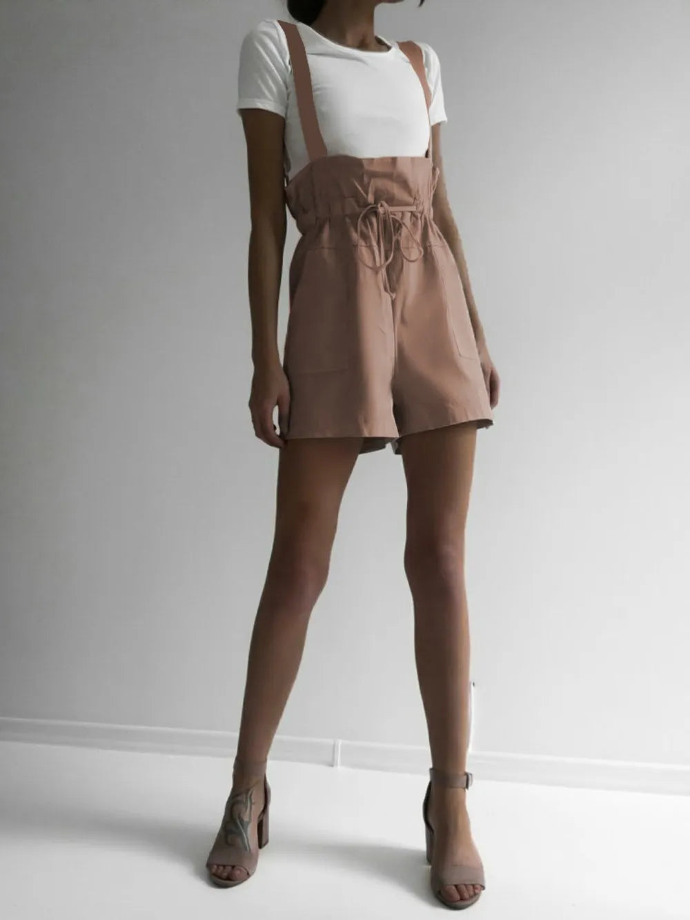 Cedar & Moore Drawstring wide-strap overalls with pockets in dusty pink, short-length, tie-waist, worn over white tee