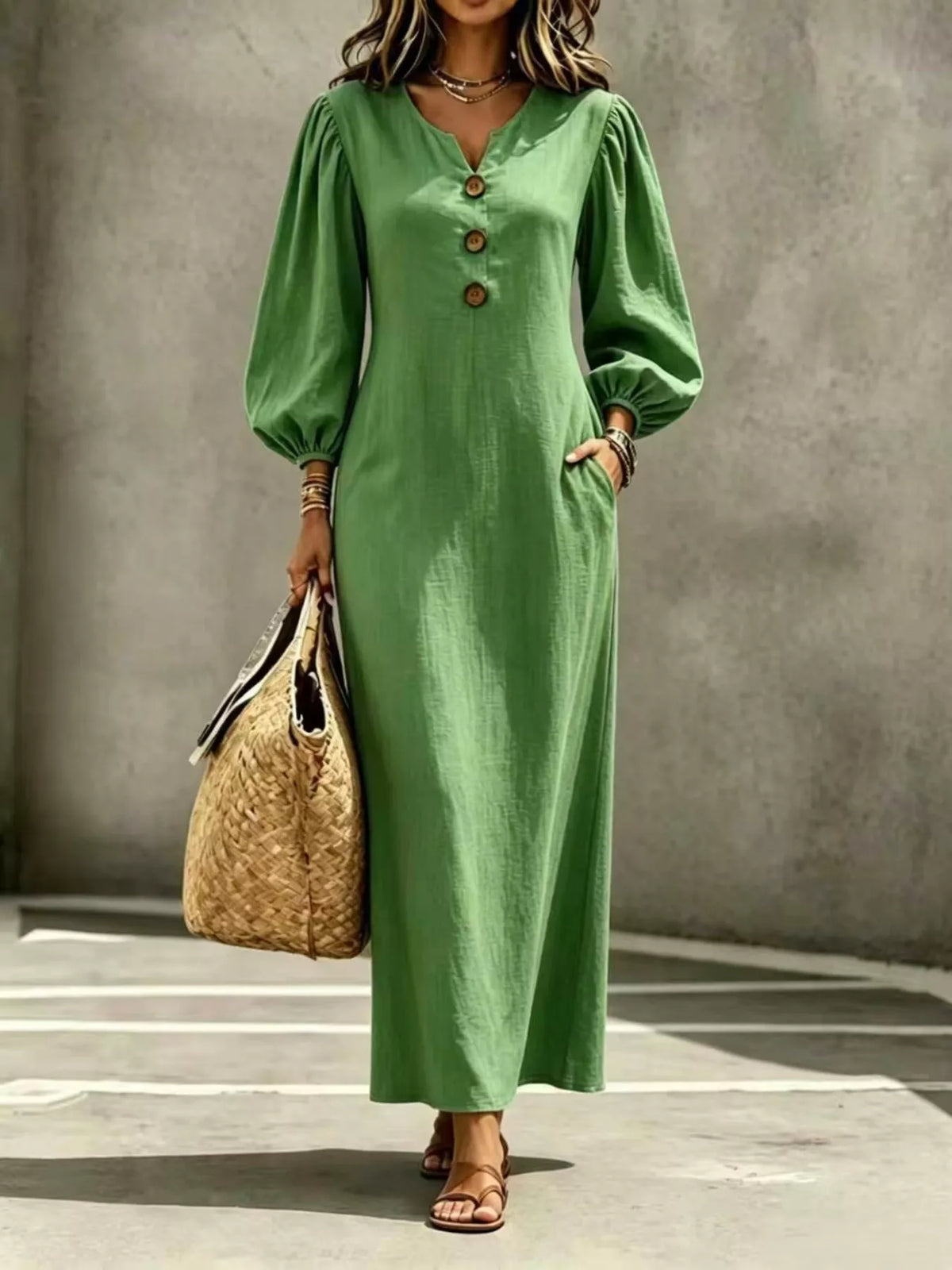 Green button-front maxi dress with balloon sleeves and gathered cuffs
