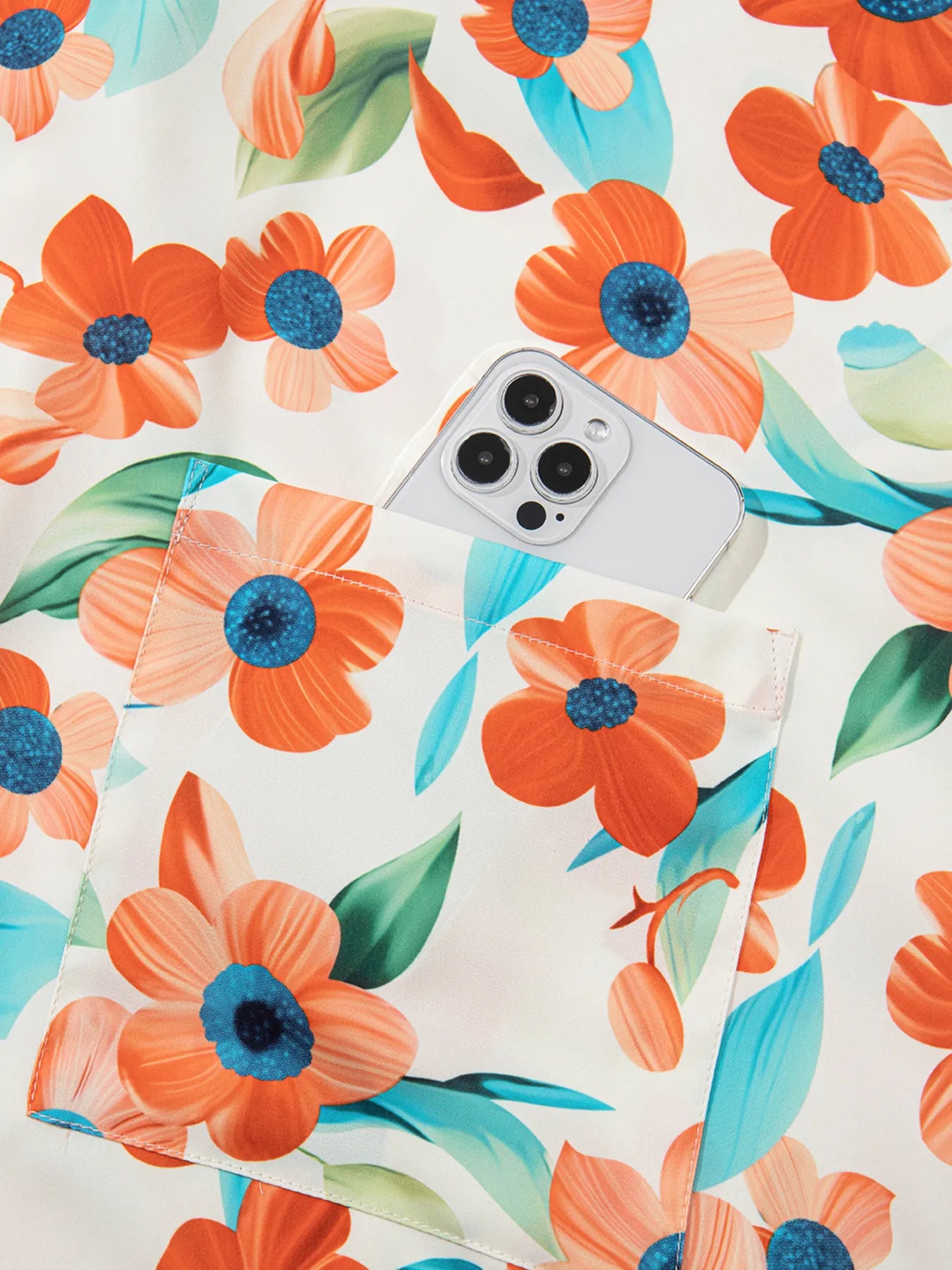 Trendsi floral split-neck puff mini dress on white with orange flowers and teal leaves, pocket visible