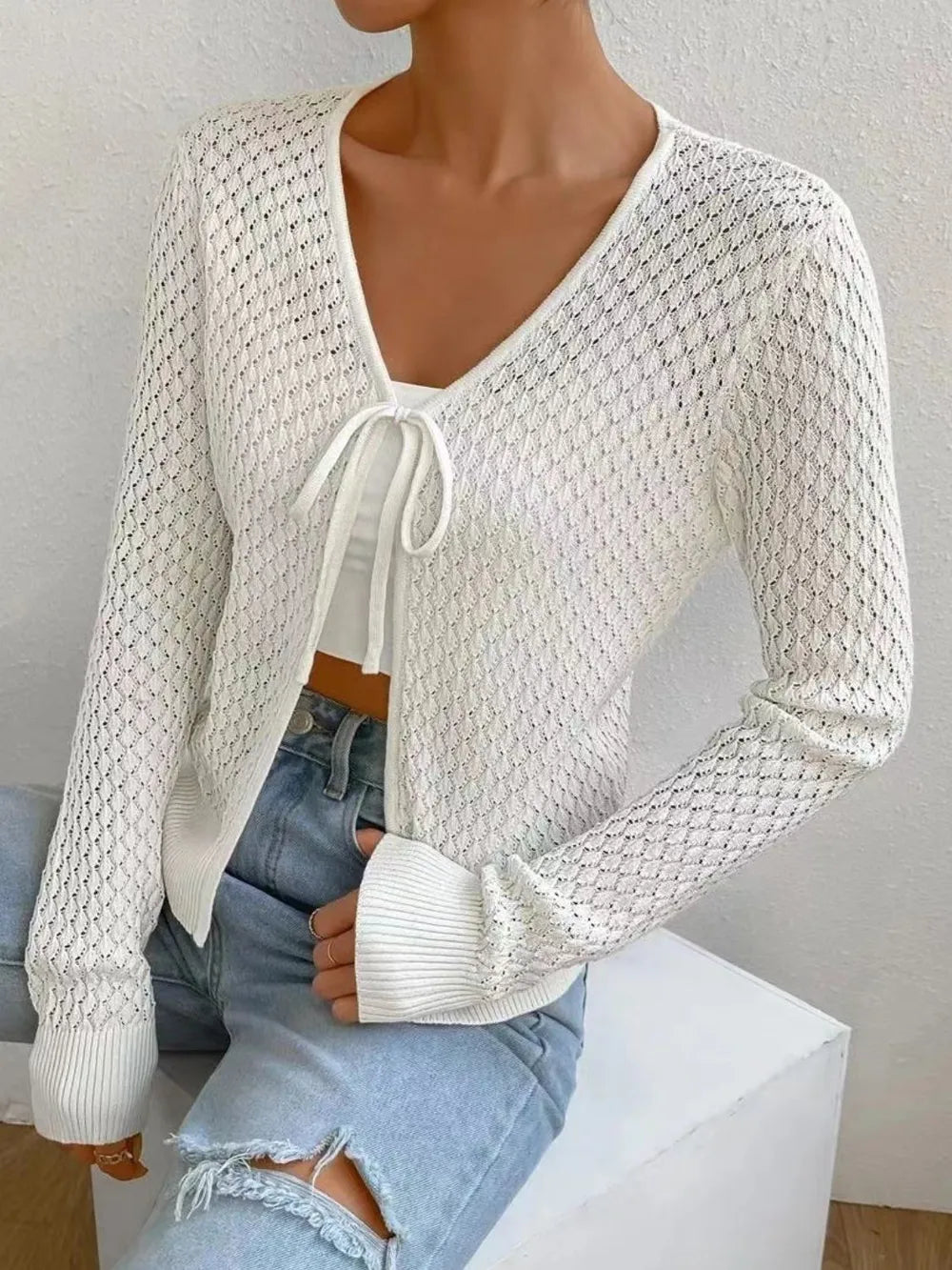 White openwork knit V-neck cardigan with tie at center front