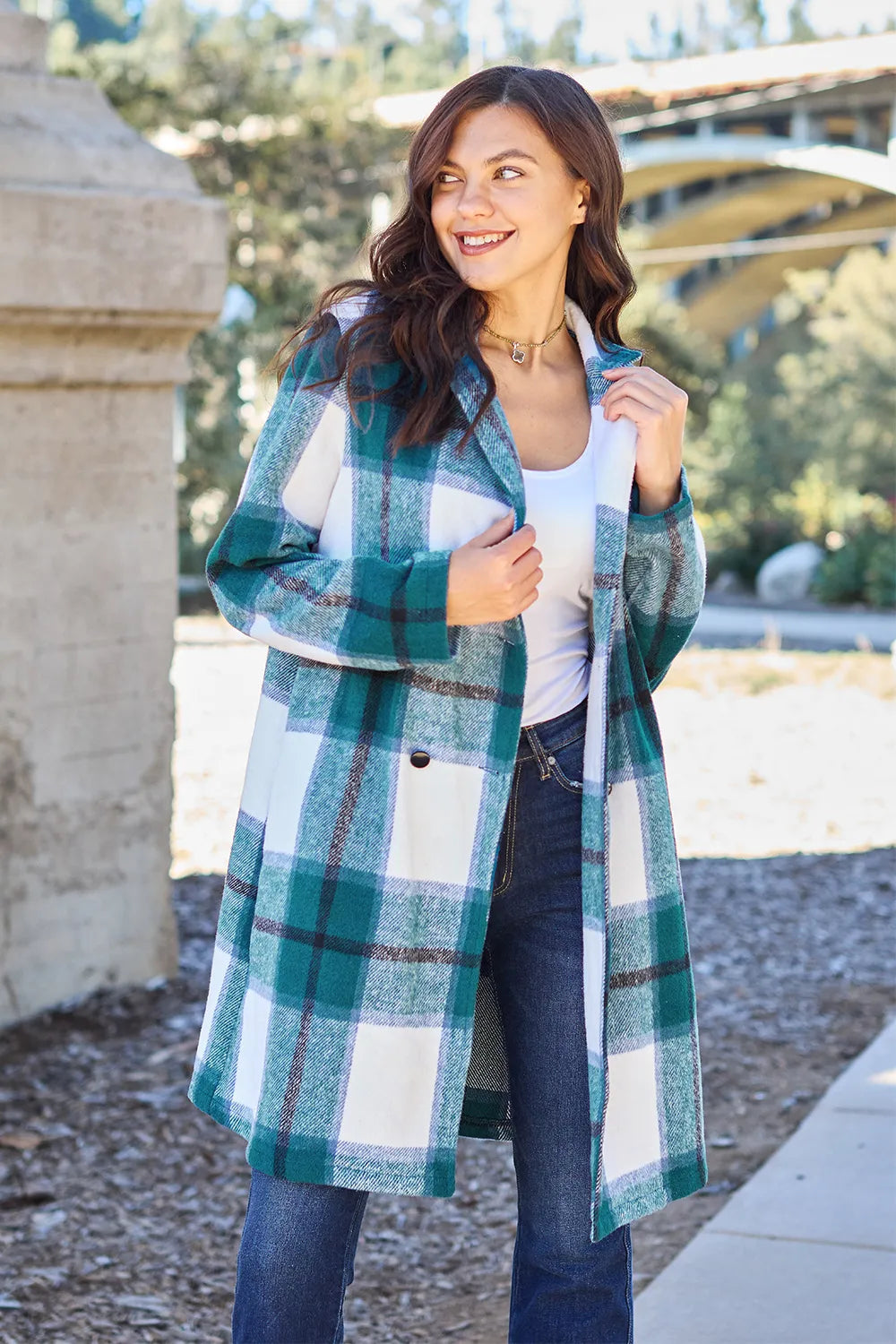 Teal and white plaid button-up lapel coat with front buttons and long sleeves