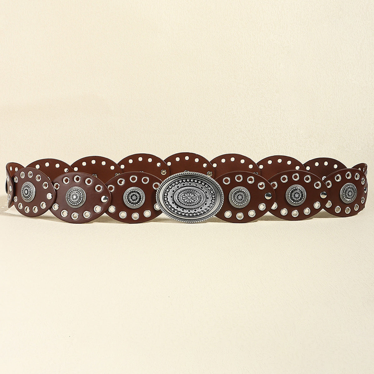 Dark brown vegan leather belt with silver oval buckle and circular stud accents