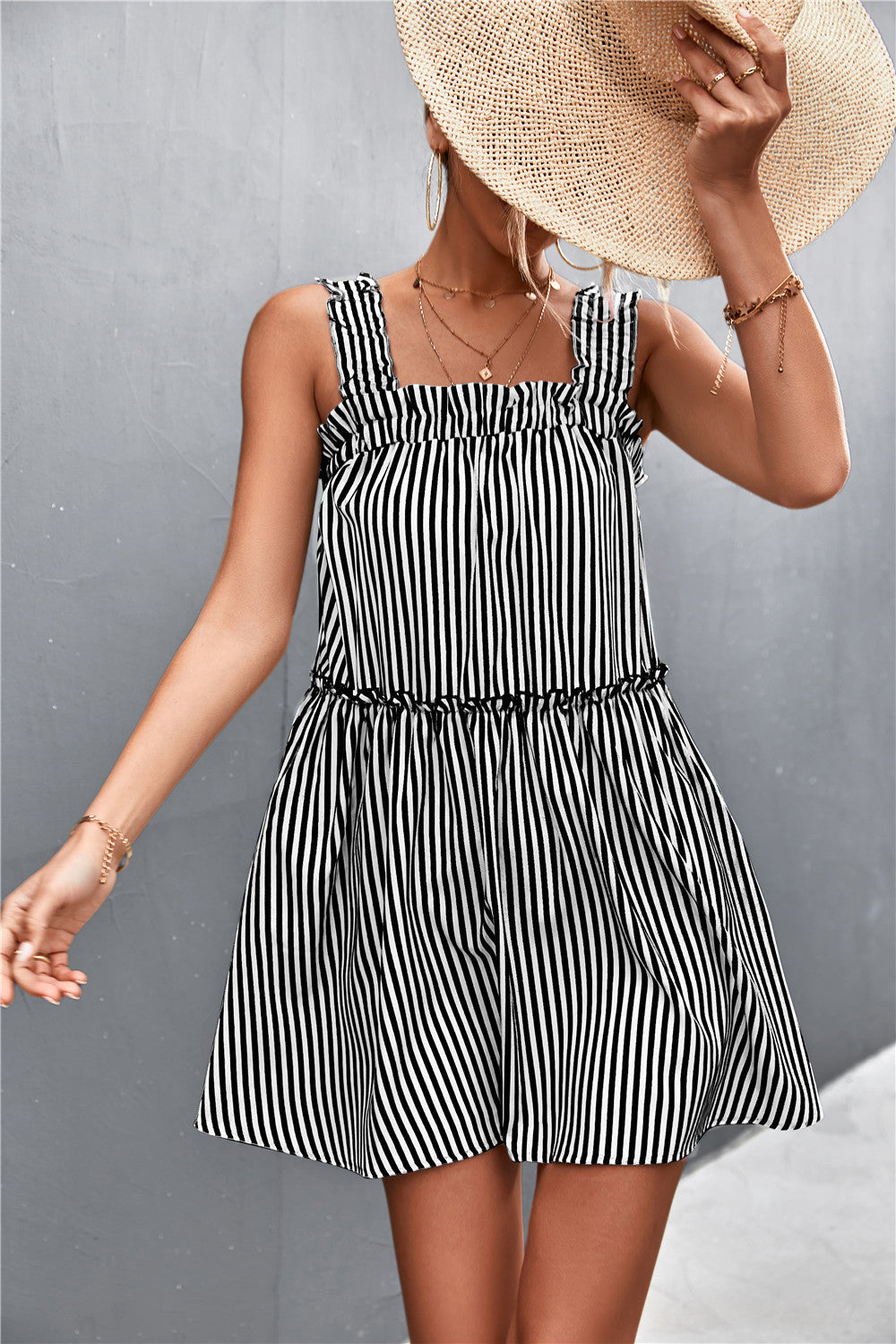 Black and white striped square-neck dress with frill-trim straps and tiered skirt
