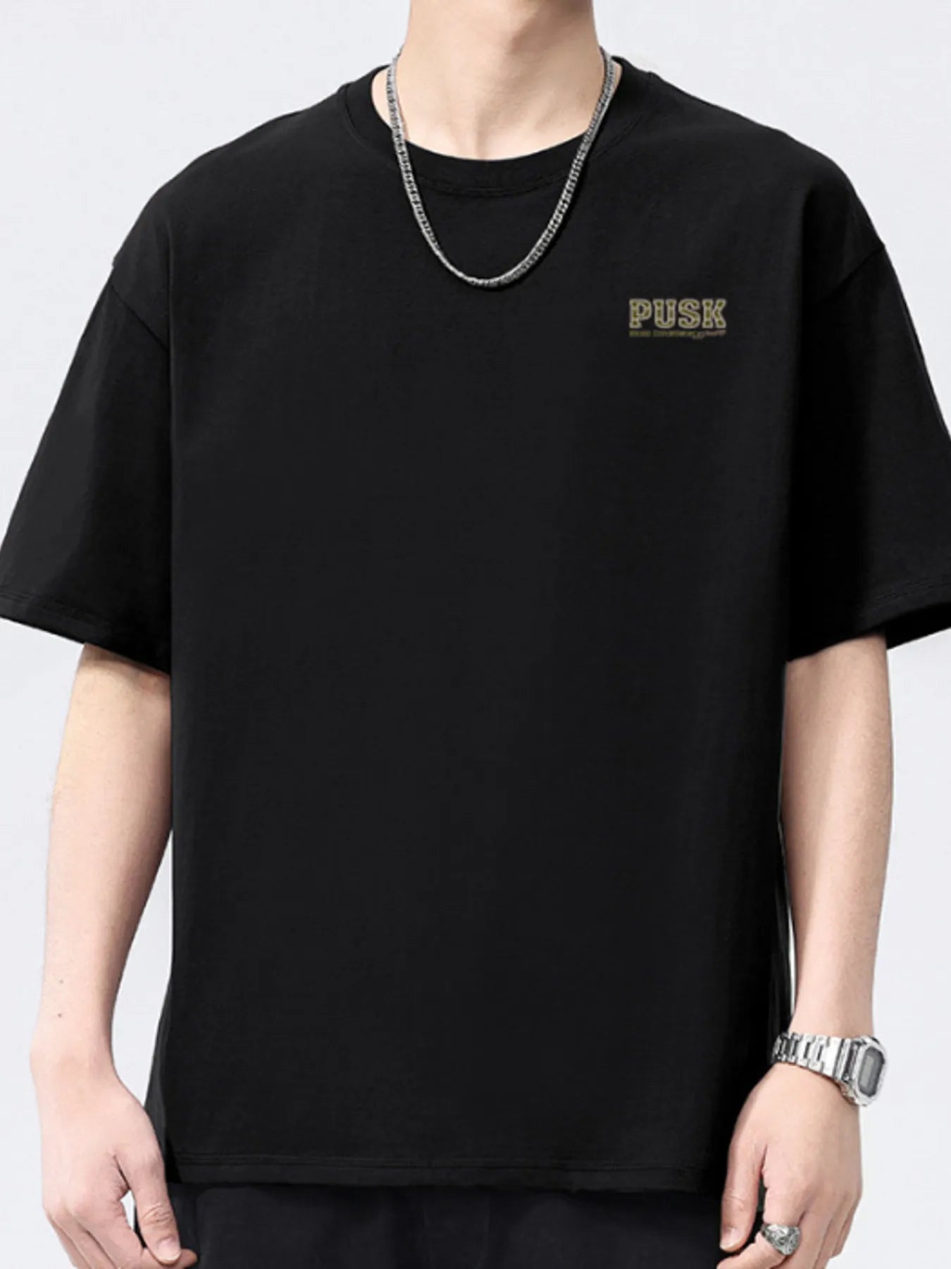 Black men's short-sleeve crewneck T-shirt with small chest logo.