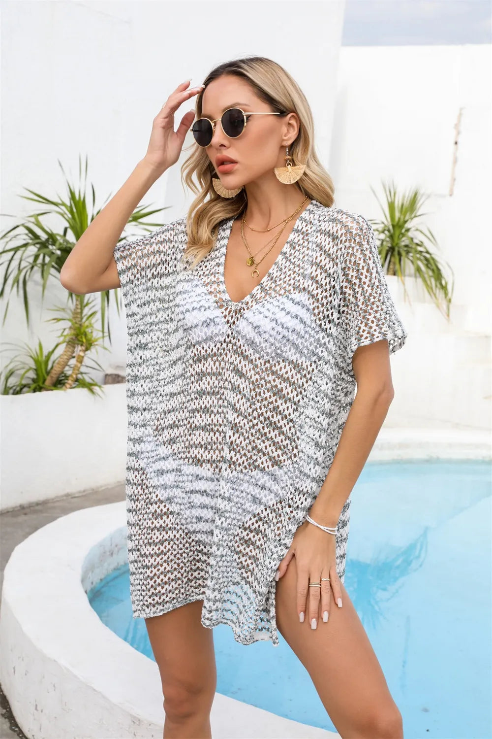 Openwork short cover-up with V-neck and short sleeves, white with dark speckle, side view