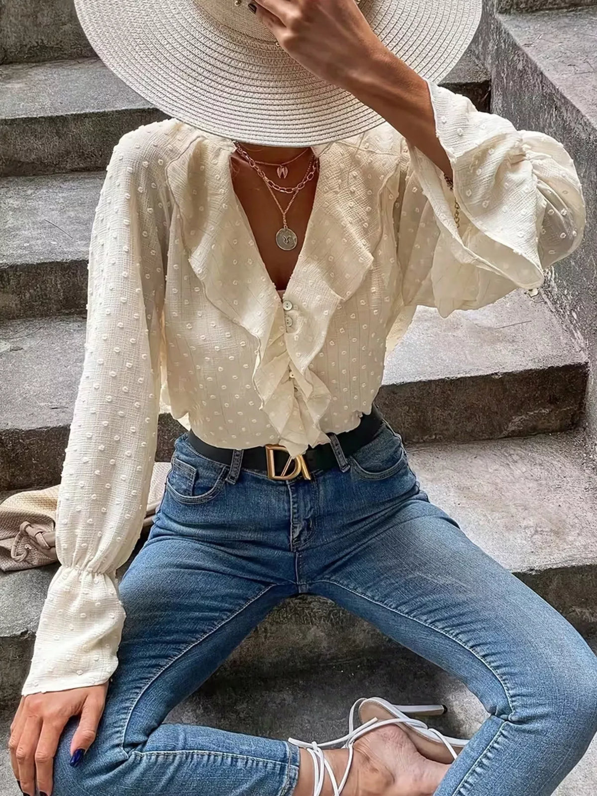 Beige Swiss-dot buttoned blouse with ruffled V-neck and long puff sleeves