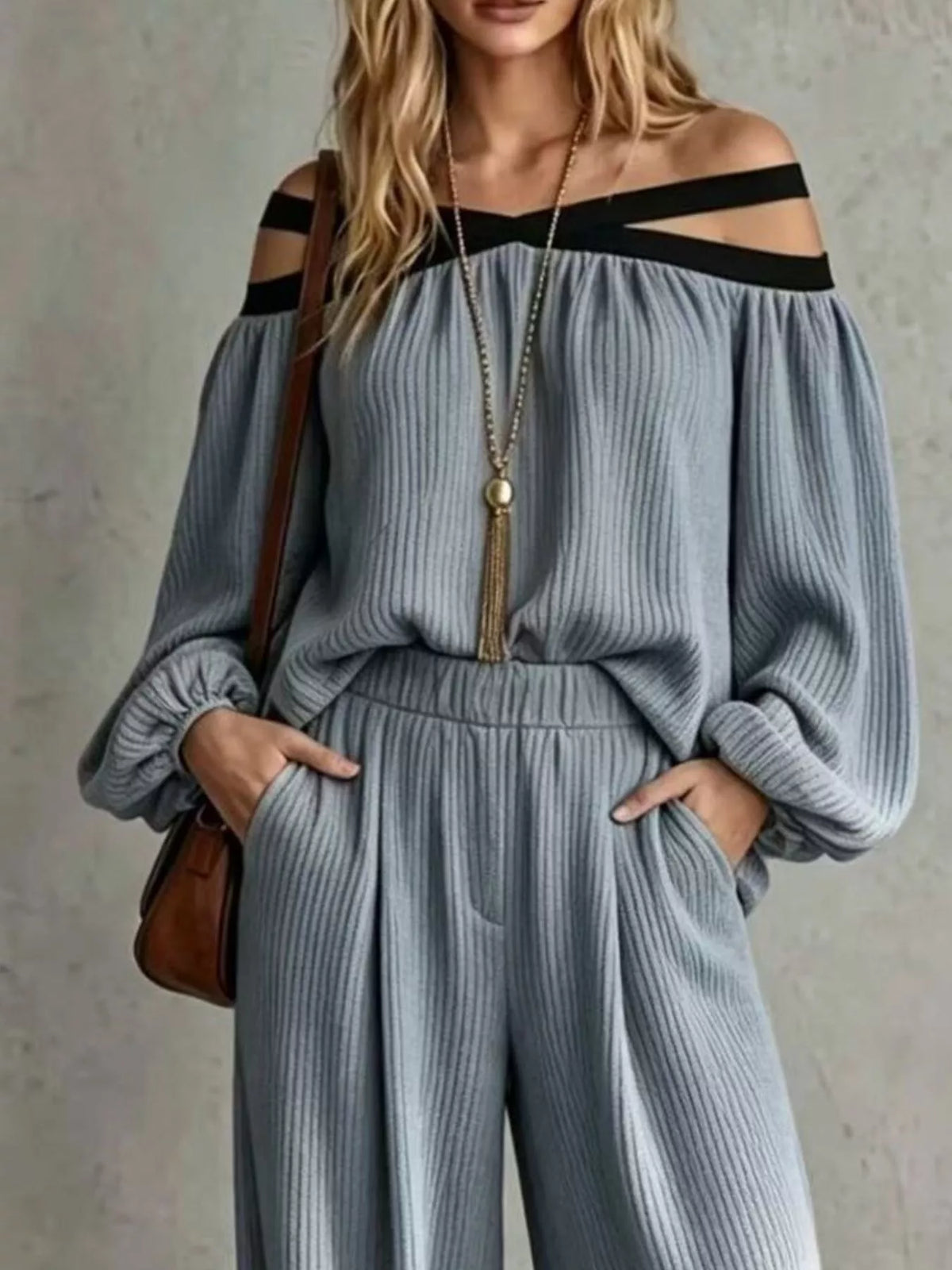 Dusty blue off-shoulder ribbed knit top with cutout strap neckline and wide-leg pants