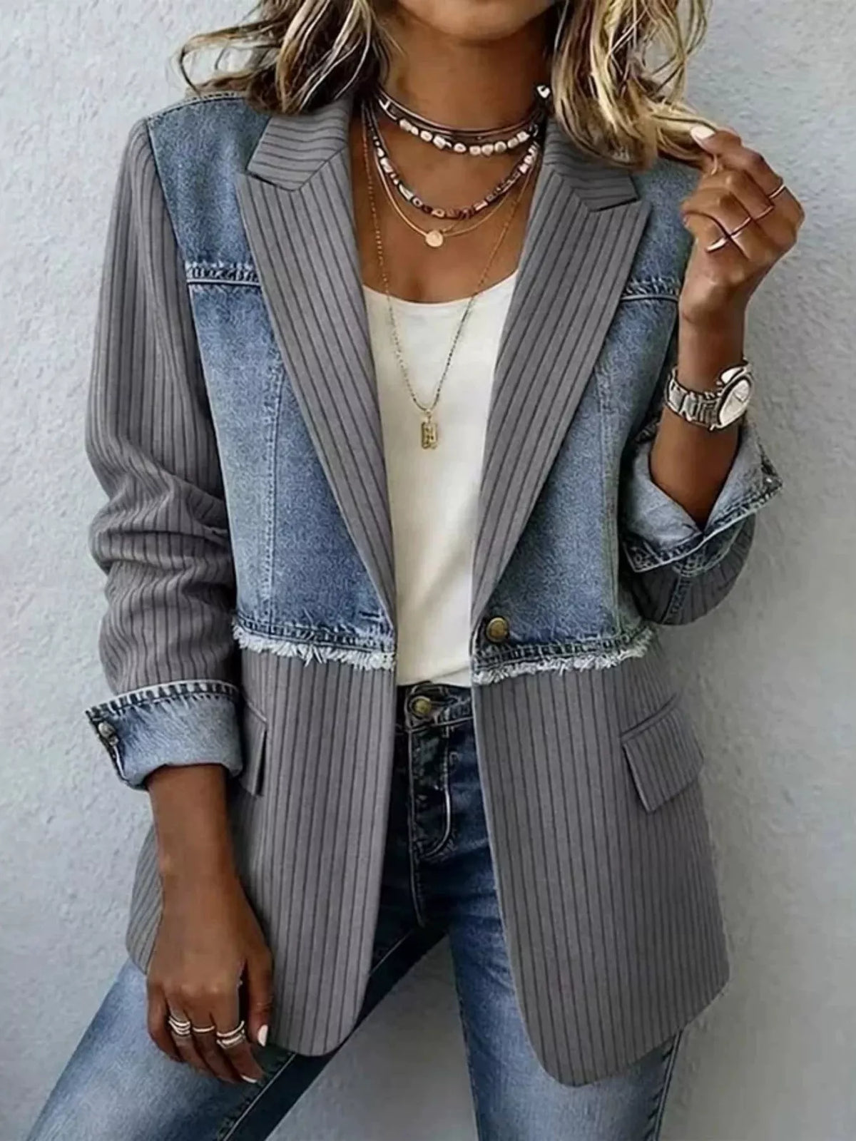 Patchwork denim and ribbed blazer with notch lapel, flap pockets, gray-and-blue panels