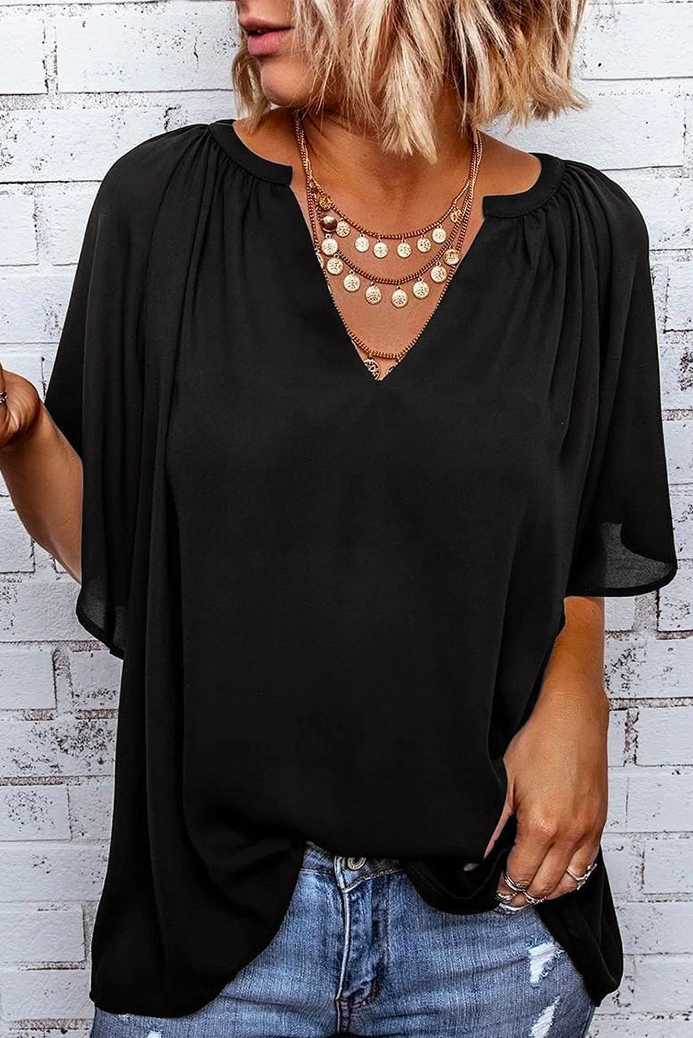 Black flutter sleeve V-neck top with gathered neckline detail