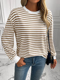 Striped long-sleeve sweatshirt with round neck, tan and white stripes, white cuffs