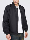 Black men’s bomber jacket with front zip, ribbed collar and cuffs, and small chest pocket