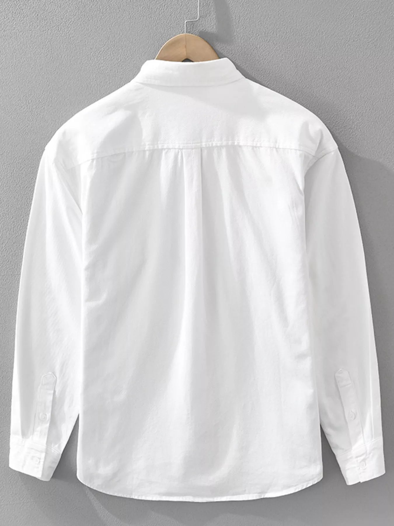 White plus size button-up long sleeve shirt, back view