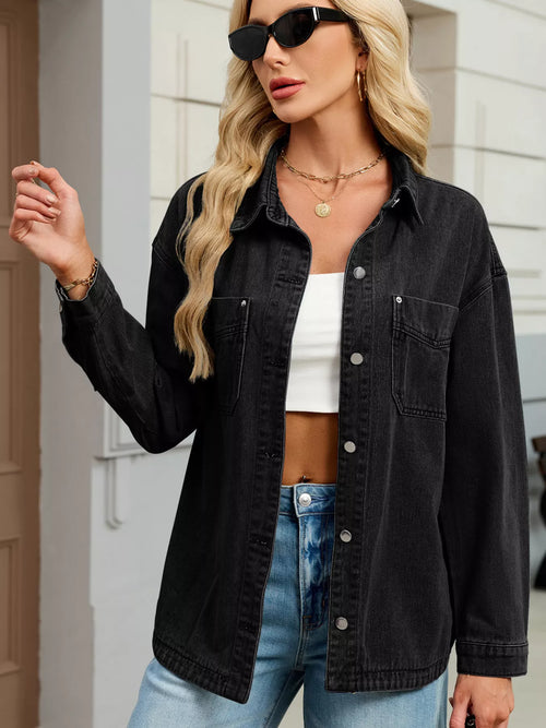 Black denim button-up jacket with dropped shoulder, button front, two chest pockets.