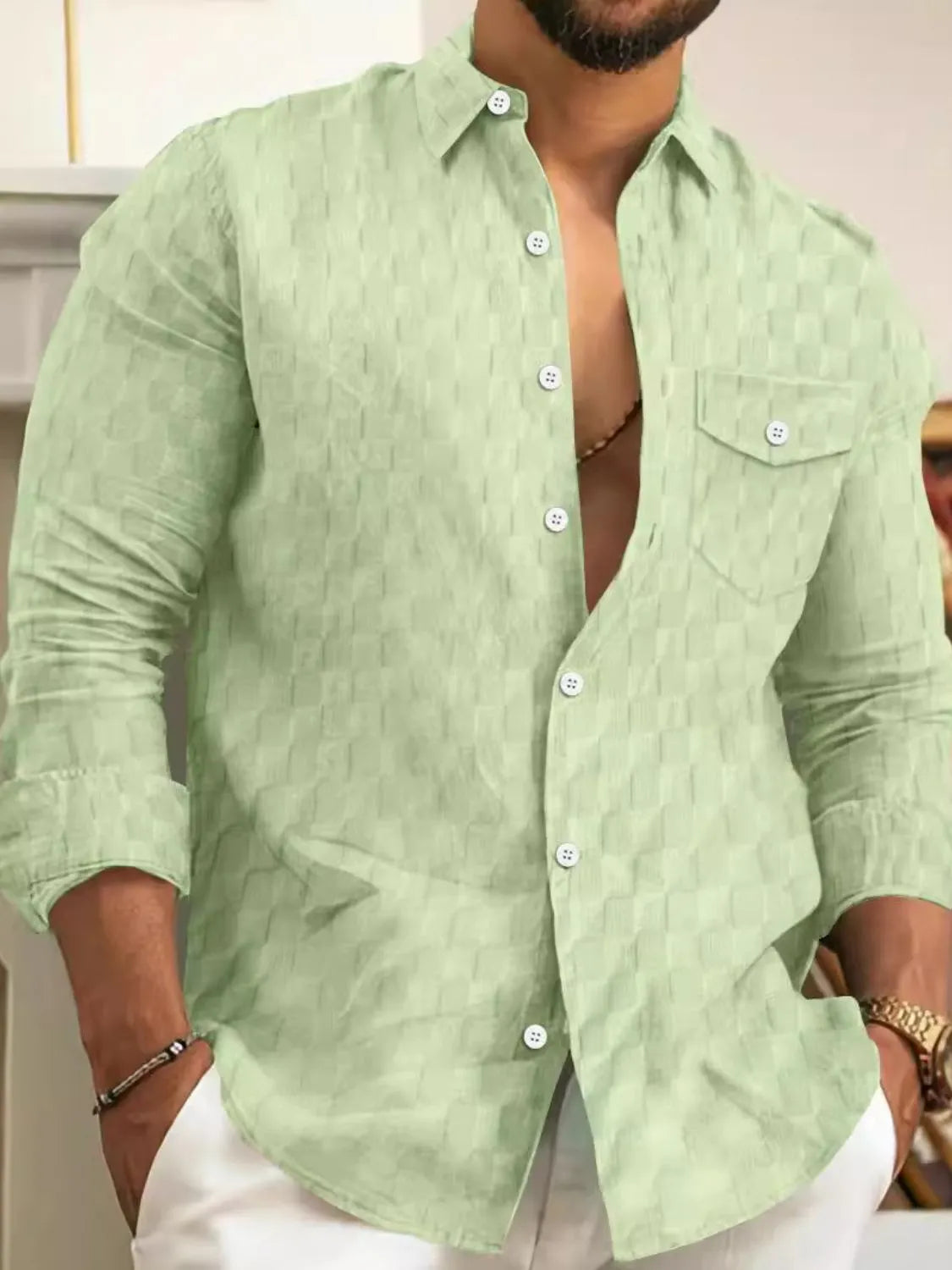 Men's button-up long-sleeve shirt, textured light green with chest pocket and button placket