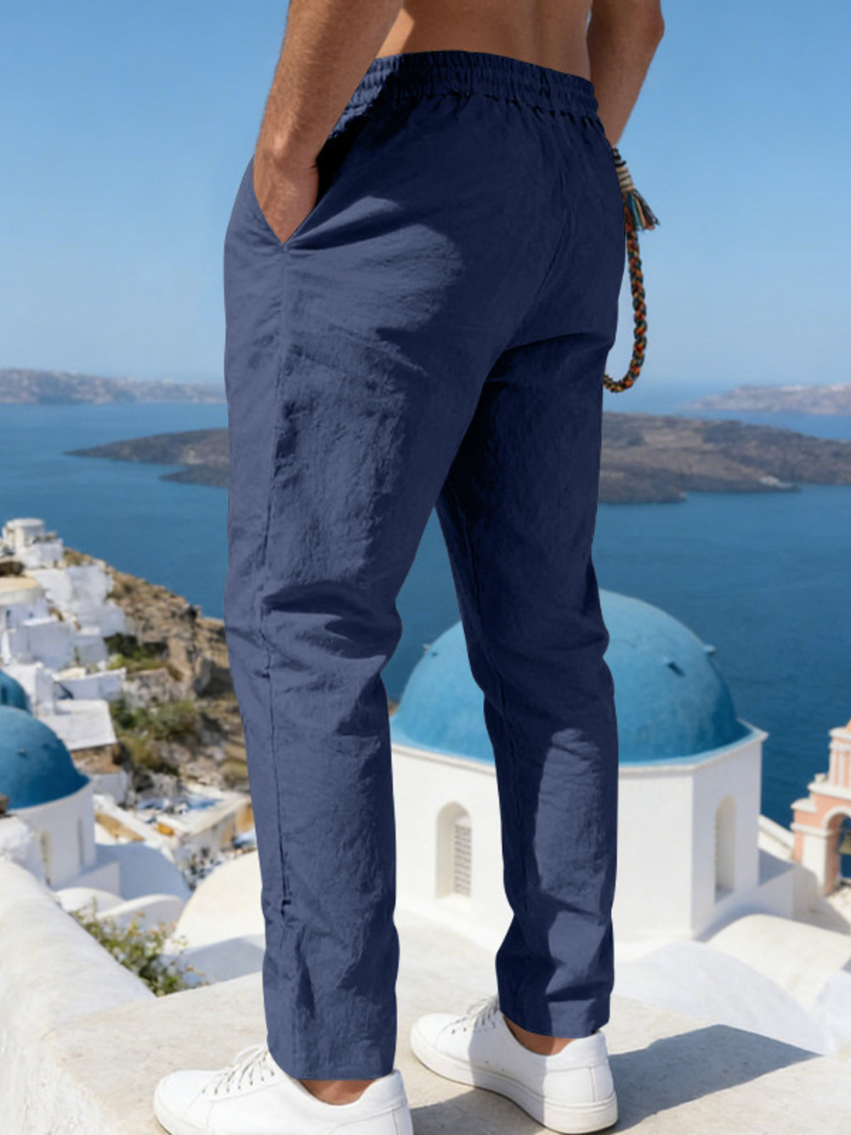 Navy drawstring casual pants with side pockets, elastic waistband and ankle cuffs