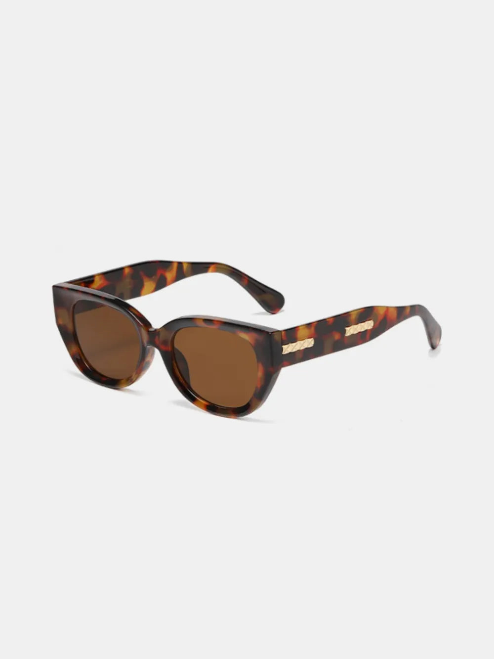 Tortoiseshell cat-eye polycarbonate sunglasses with amber-brown tinted lenses