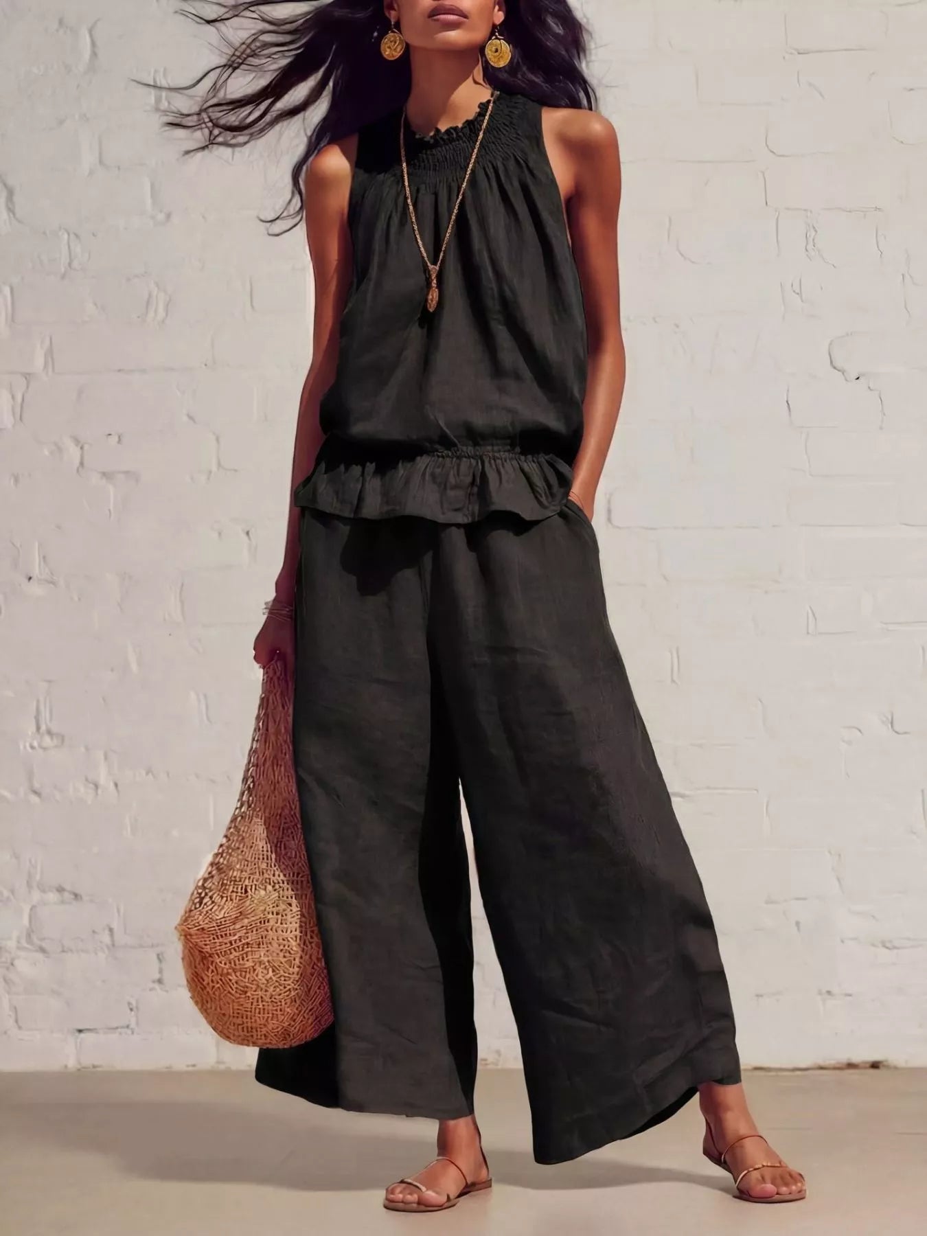 Smocked ruffled top and wide-leg pants set, black sleeveless with ruffle trim