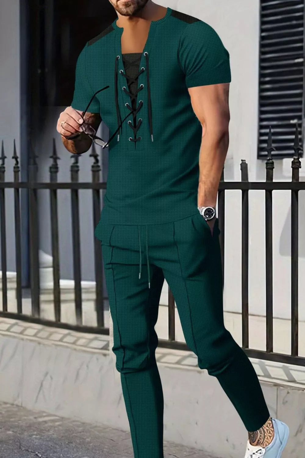 Men's casual two-piece pants set, dark green short-sleeve top with lace-up detail and jogger pants
