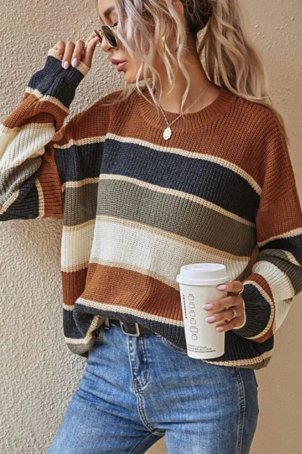 Striped round-neck long-sleeve sweater with brown, navy, cream, and tan block stripes
