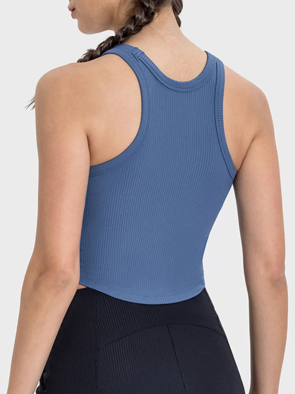 Dusty blue ribbed active tank with racerback and round neckline, back view