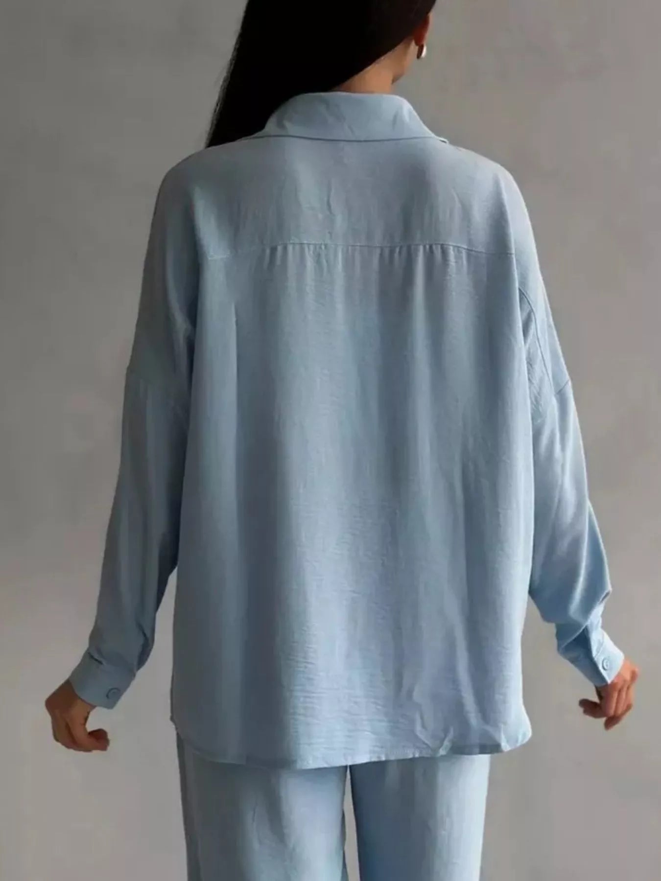 Light blue relaxed-fit back button-up shirt and wide-leg pants with elastic waist