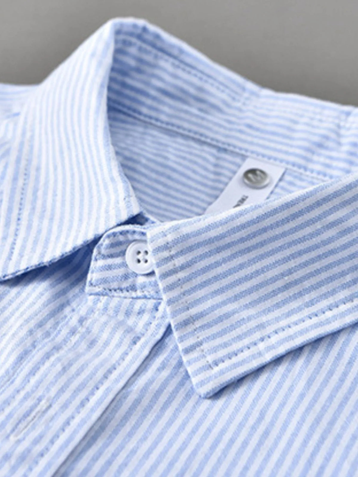 Mens blue striped cotton shirt collar with buttoned placket