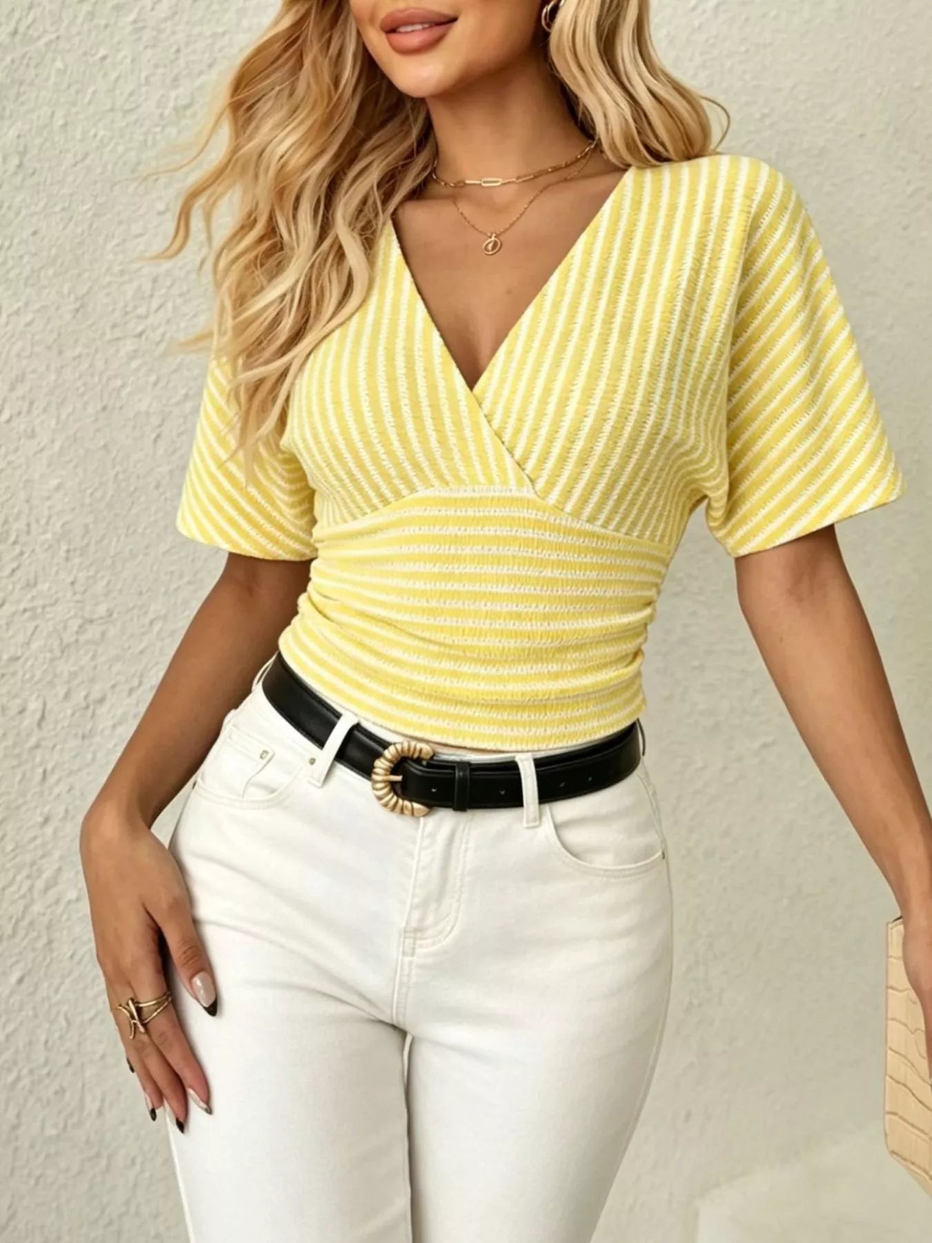 Yellow striped surplice short sleeve top with V-neck and gathered waist