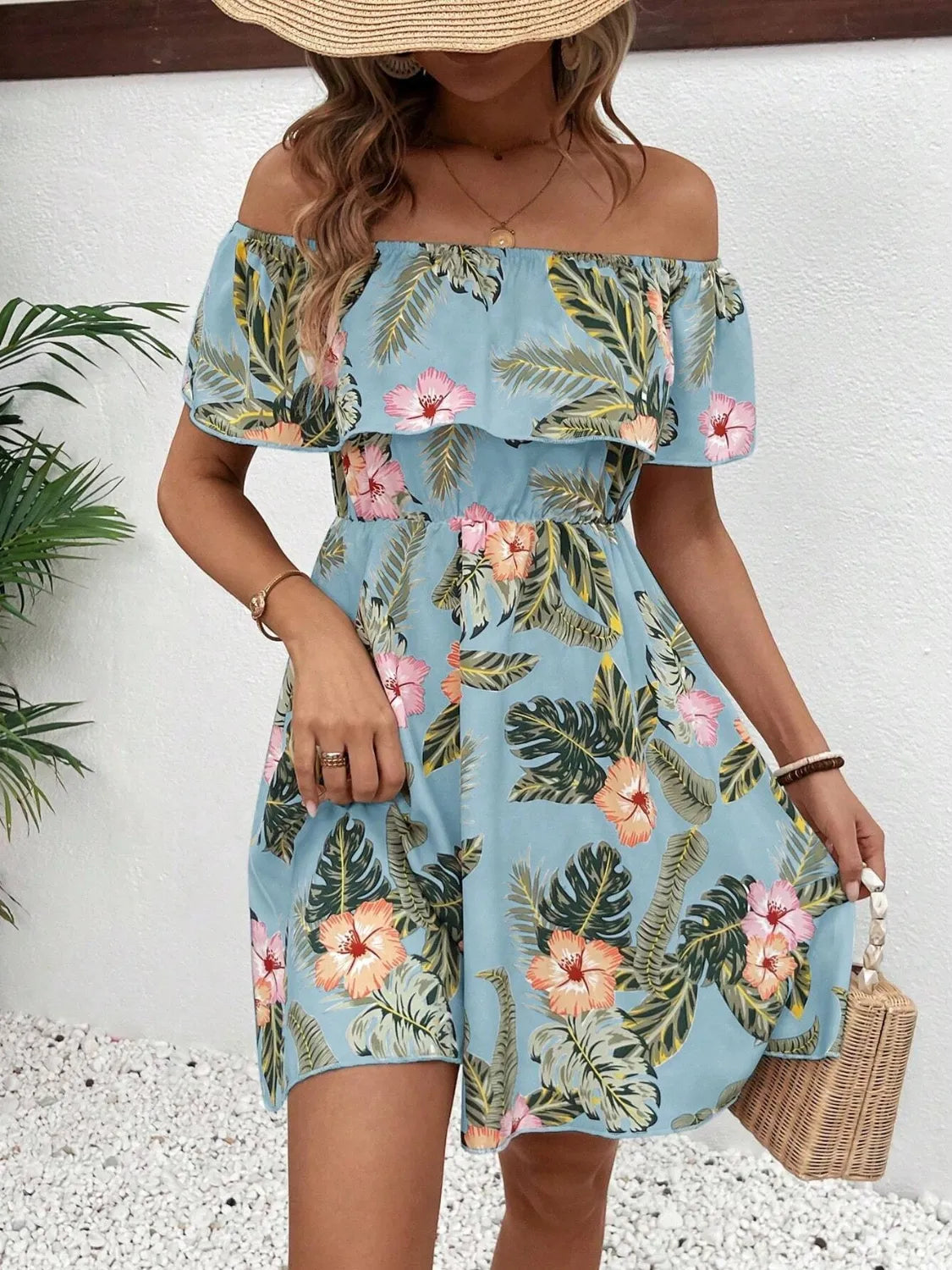 Printed Off Shoulder Mini Dress in blue tropical floral print with a ruffled overlay.