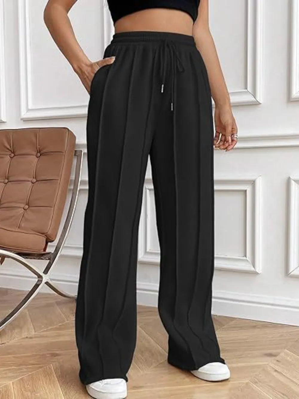 Black wide-leg pants with drawstring waistband and side pockets
