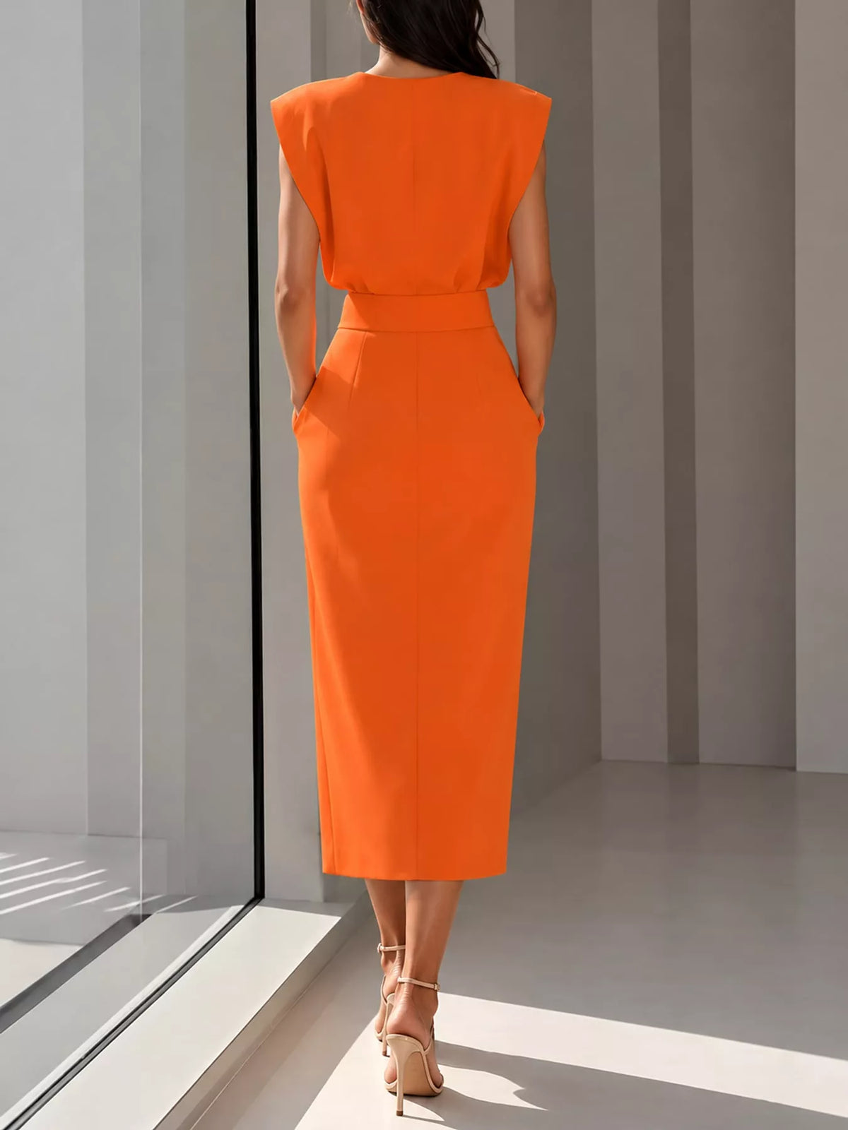 Orange sleeveless midi dress back with waist seam
