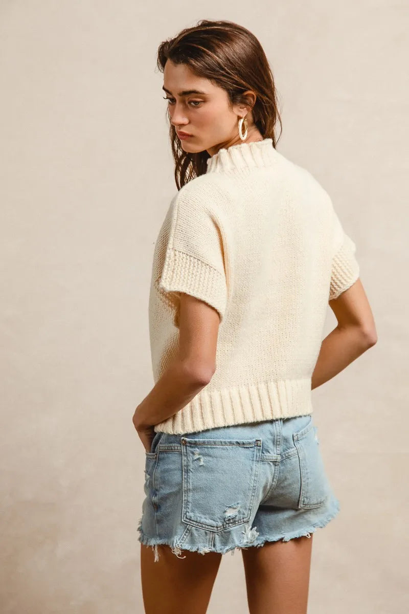 Oatmeal drop-shoulder knit sweater with short sleeves, crew neck, and ribbed hem
