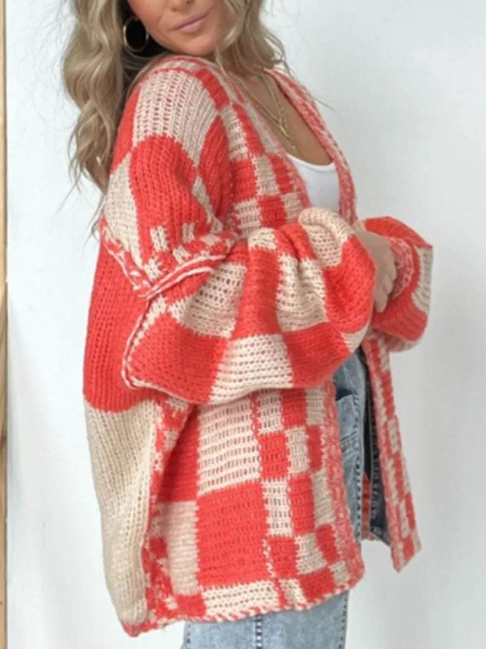 Plaid open-front long sleeve cardigan in red and cream knit with draped sleeves