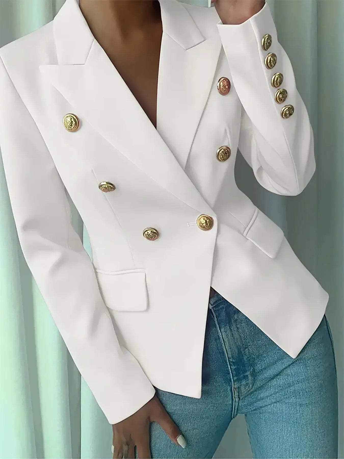 White double-breasted lapel blazer with gold decorative button details and flap pockets