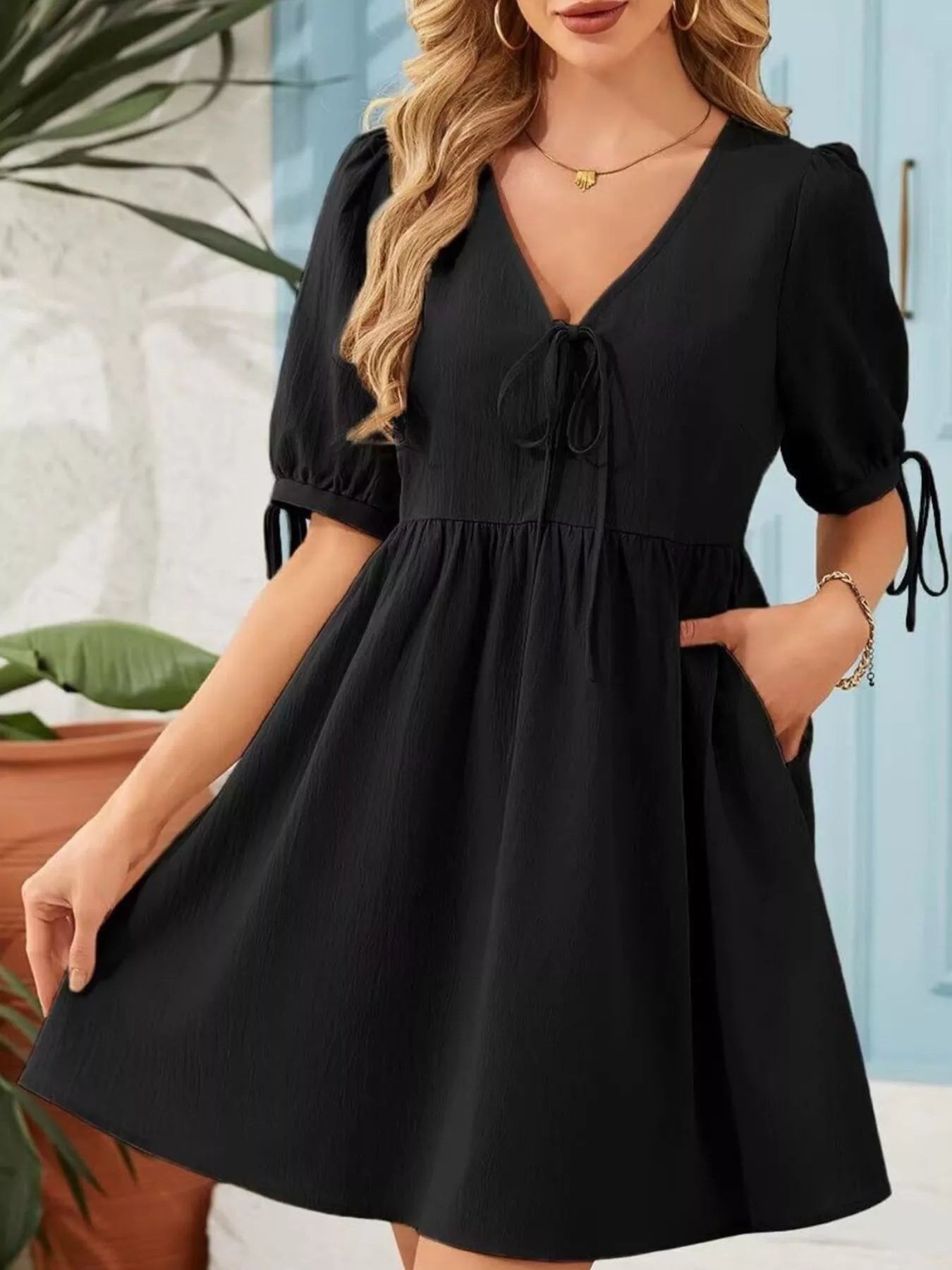 Tie-Neck Puff Sleeve A-Line Mini Dress in black by Trendsi