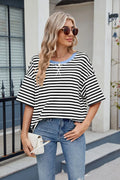 Black and white striped crew neck half sleeve T-shirt with blue contrast neckline trim