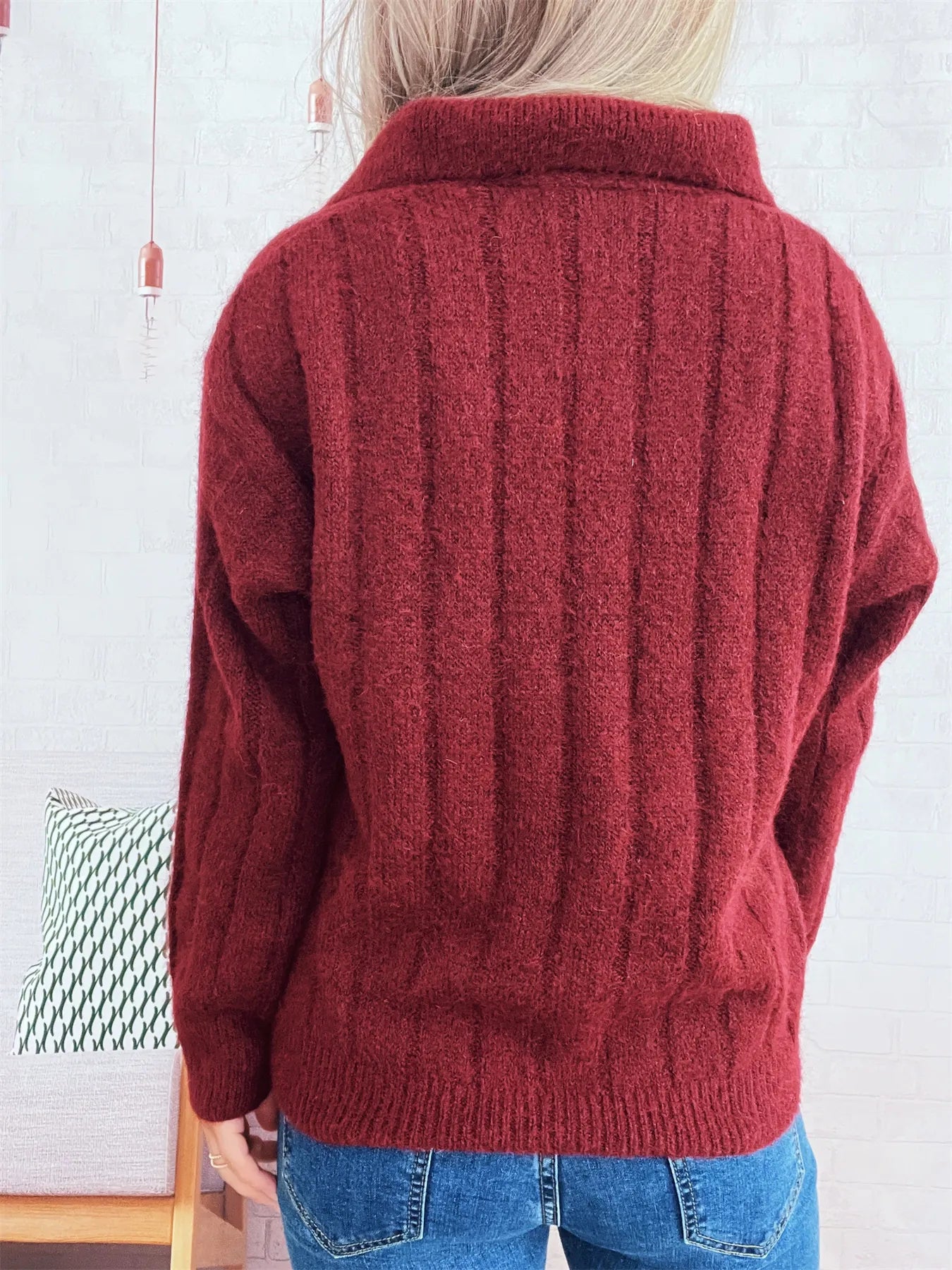 Ribbed hem quarter-zip sweater, burgundy back view with ribbed hem and long sleeves.