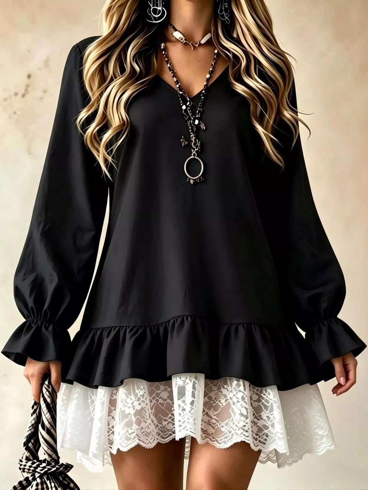 Black V-neck flounce sleeve dress with puff cuffs and lace hem overlay