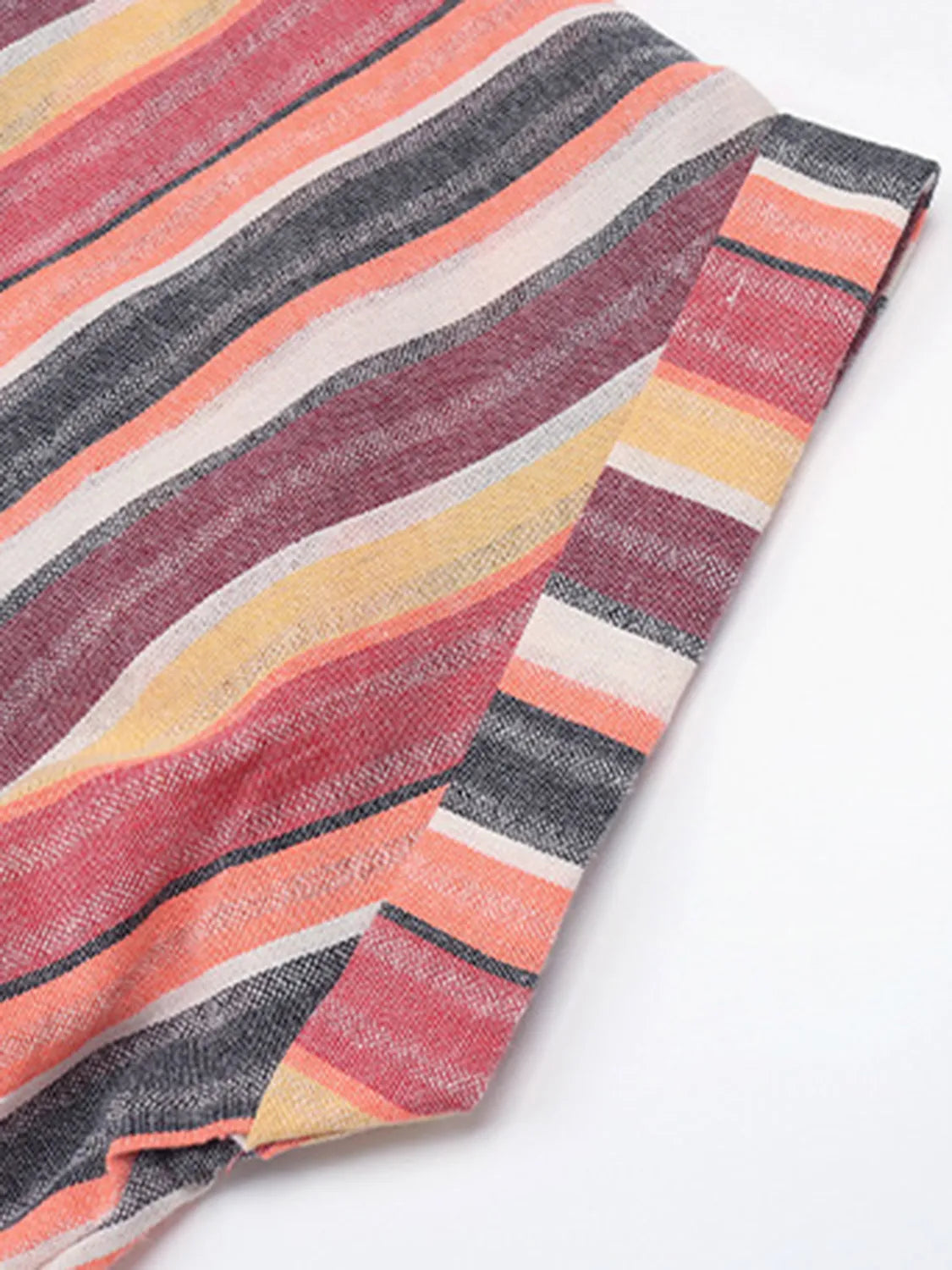 Striped surplice short-sleeve dress fabric close-up in coral, pink, yellow, navy