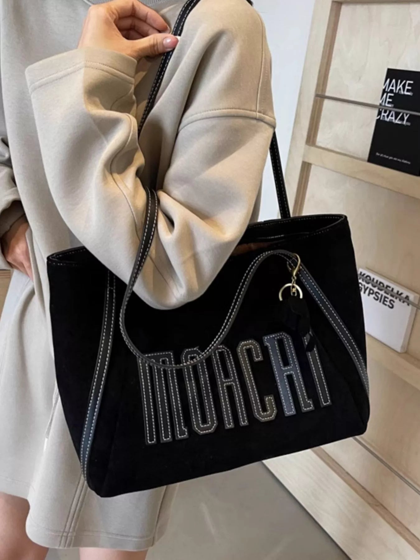 Casual Letter Shoulder Bag, black with large white-stitched lettering, medium size.