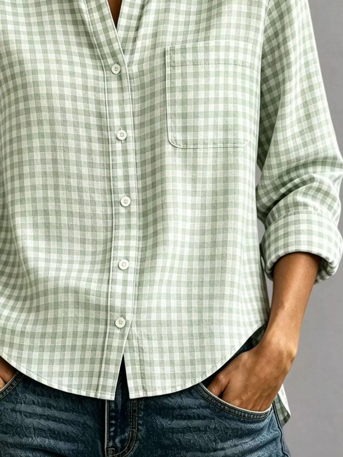 Light green gingham long-sleeve button-down shirt with chest pocket and button front.