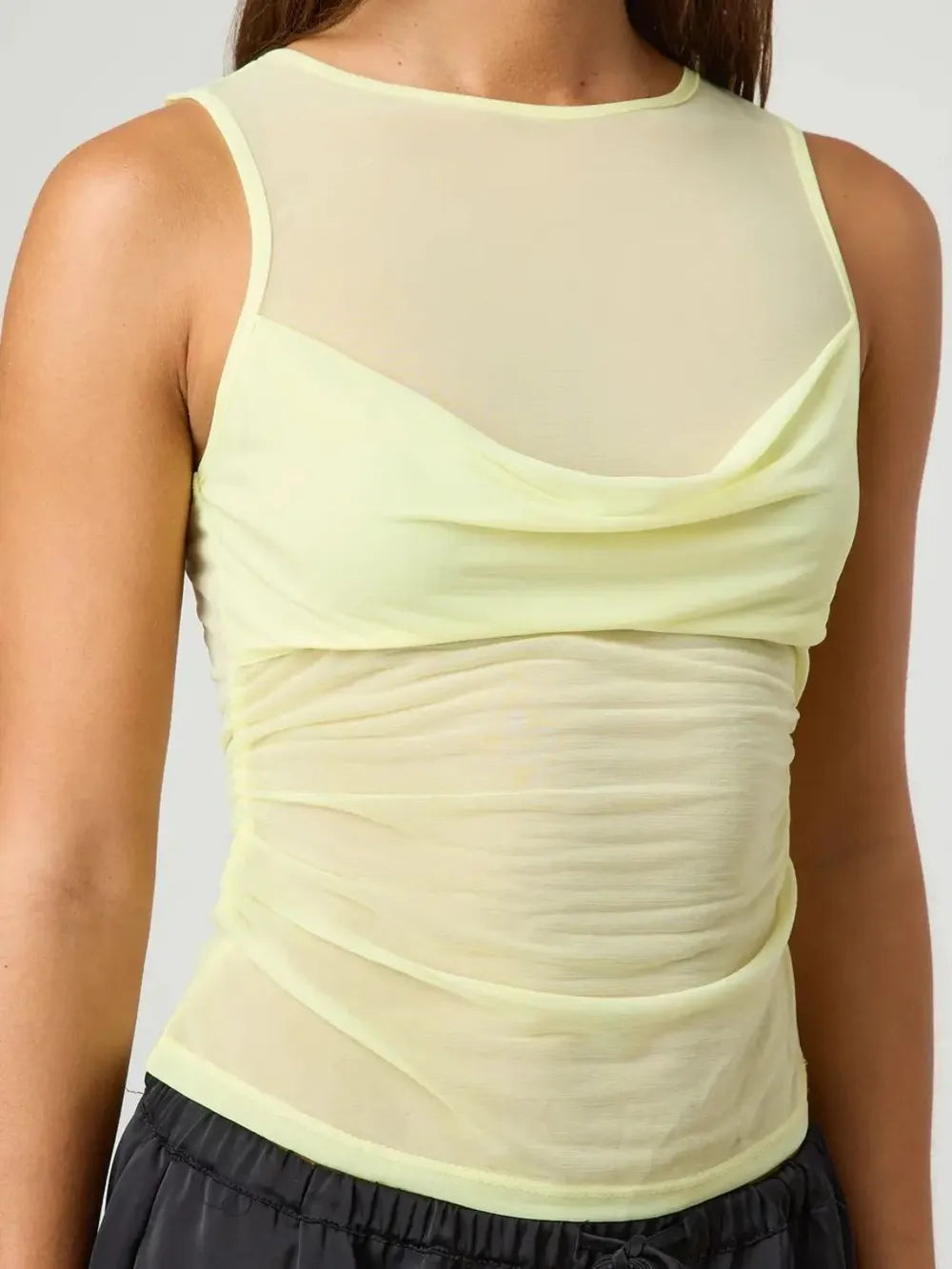 Pastel yellow ruched round-neck sleeveless tank top with draped diagonal seams