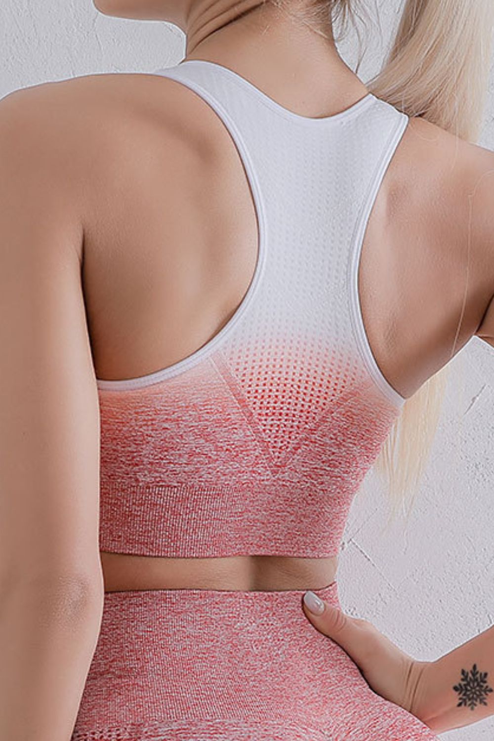 White and pink gradient racerback sports bra with scoop back and knit support panel